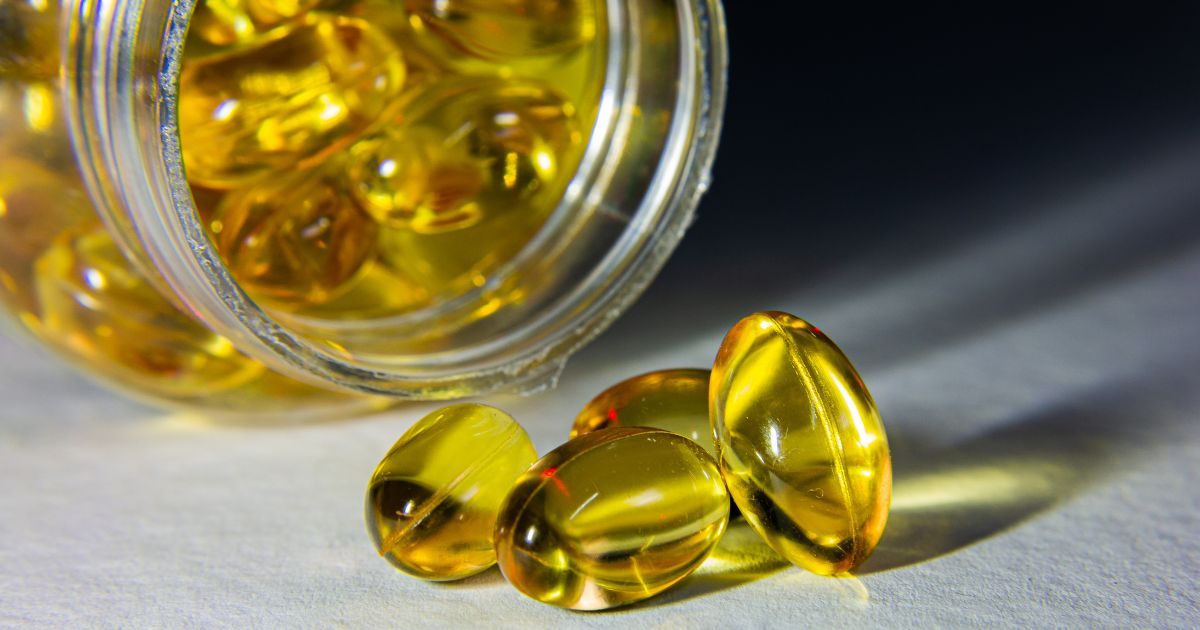 close up of vitamin D supplement capsule